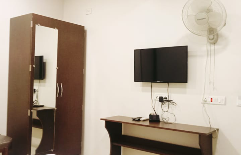 Room TV & Wardrobe Amenities